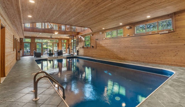 10,000 Sq. Ft. Home on 15 hunting acres with an in-door pool and sauna