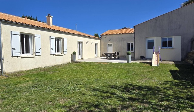 A comfortable home with a garden and a terrace