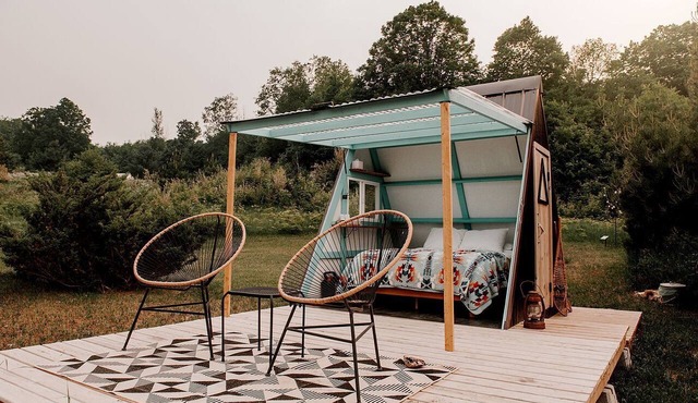 A-Frame Serenity: Tiny Cabin with Panoramic Scenery in Michigan's Tranquil Setting