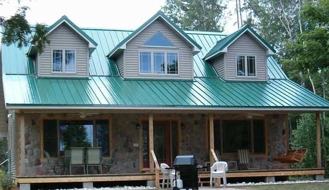 Beautiful Lakefront Home with Pontoon on S. Manistique Lake