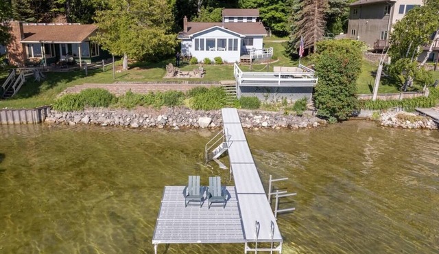 Beautiful Leelanau County cottage & guest bunkhouse on 75' of waterfront.