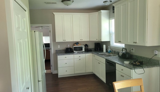 Beautiful remodeled house a short walk to lake with shared pier.