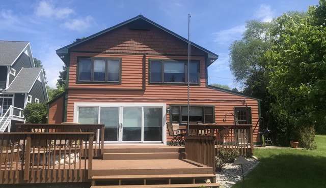 Beautiful spot on Lake Leelanau, 4-bedrooms, includes dock and kayaks.