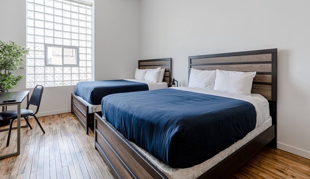 Bright, Comfortable Condo with Amazing Rooftop Deck! Perfect Location by RedAwning