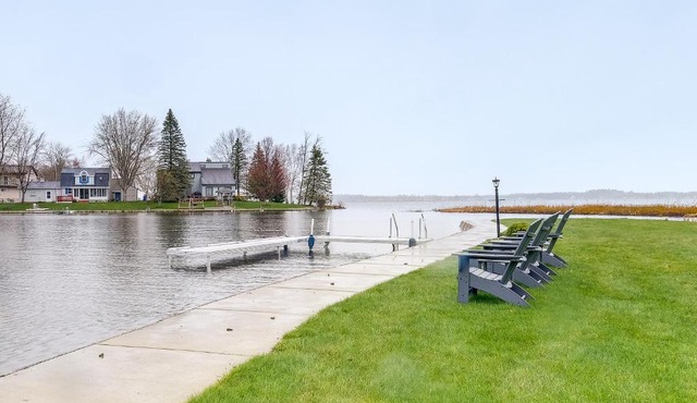 Cadillac Vacation Rental w/Dock on Lake Mitchell!