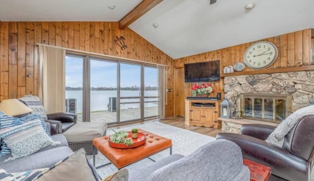 Canadian Lakes, Michigan beach home on private lakenn
