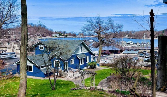 Charming Waterfront Cottage with Modern Remodel Overlooking Lake Macatawa Harbor, Near Macatawa, Michigan