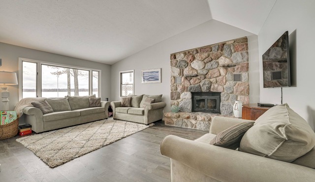 Dock & Views: Lake Mitchell Home in Cadillac!