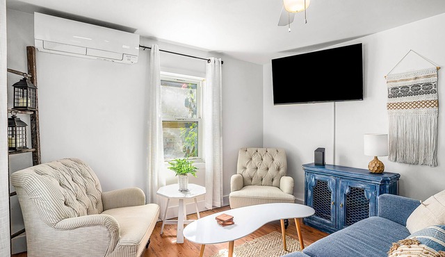 Dog-friendly retreat near the lake with charming fixtures, large yard, & firepit
