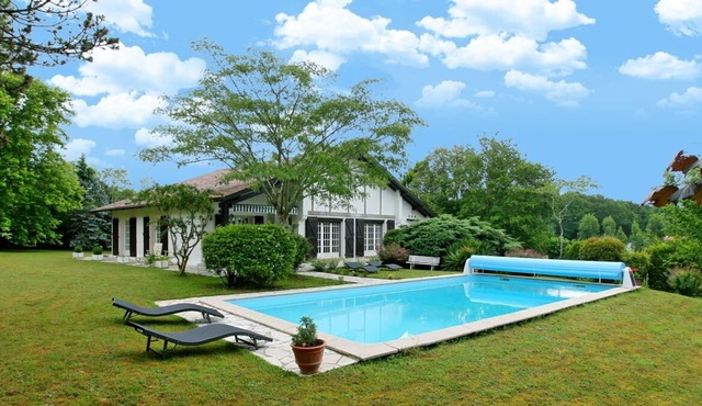 Experience this Basque Style Retreat with Charming Gardens and Heated Pool in Arbonne