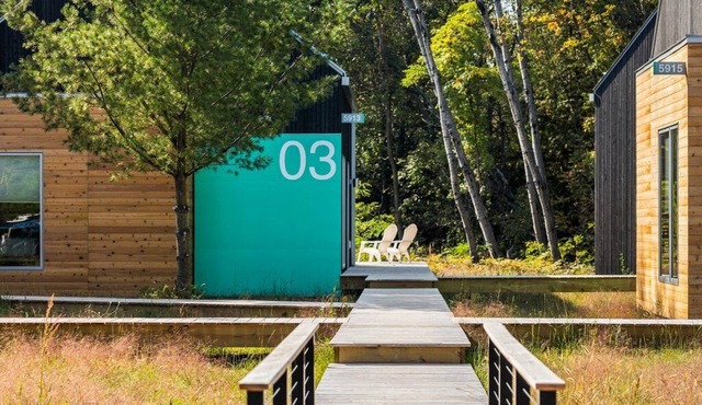 KOTI 3 (Two Bedroom) Traverse City's Scandinavian Cabins, vacation home on TART & mins to Traverse C.