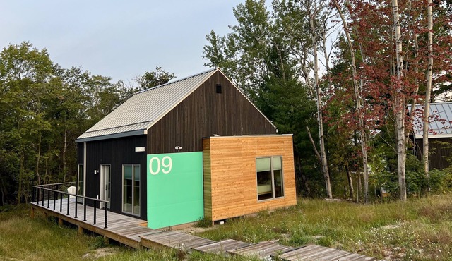 KOTI 9 (Two Bedroom) Traverse City's Scandinavian Cabins, vacation home on TART & mins to Traverse C.