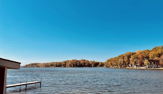 Lake front cottage with private beach and docks!