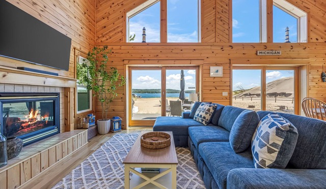 Lake frontage, Dune beach sand from deck to water! One of a kind.