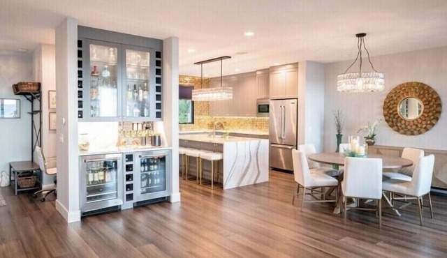 Lake Michigan home with beautiful beach frontage accessible from back yard.