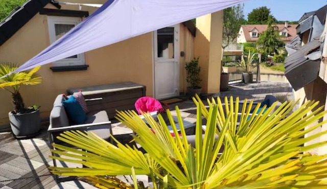 "Le Rooftop de la fontaine", in a quiet, green setting