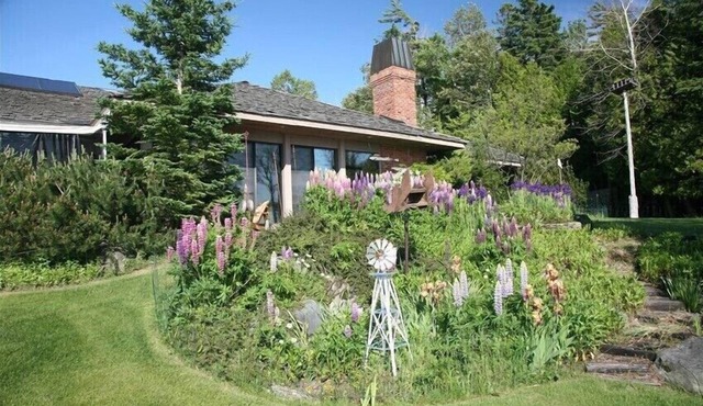 Luxury Lakefront Property with private dock, tennis court, trails & views