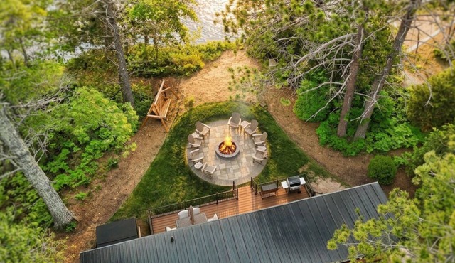 Near Pictured Rocks and trails, on the AuTrain River, has private hot tub