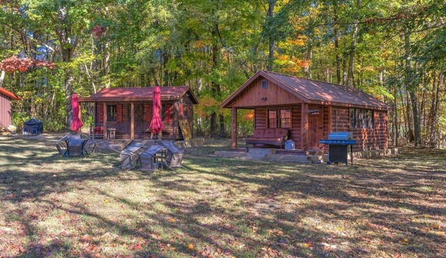 NEW! Wooded Acres Resort - 2 Small Cabins Plus Separate Building with 2 Bathrooms! Includes A/C and Heat! Dog-friendly with Tents Allowed!