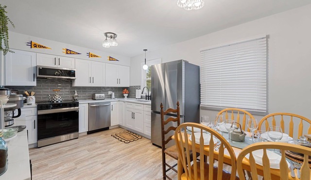 ONU Guest House presents an Elegant Cottage w/King Bed, Arcade, Gym & Theater