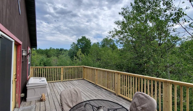 Peaceful Manistee River Front Home