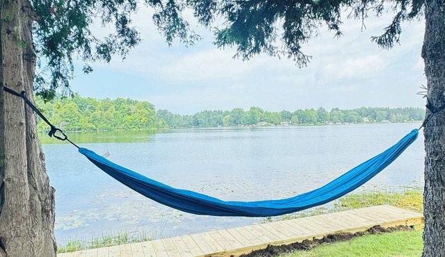 Perfect 2-bedroom cottage in adorable Fremont on a private lake stocked.