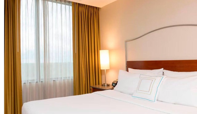 Relax in 2 Family-Friendly Suites w/Heated Pool & Hot Breakfast Near Airport