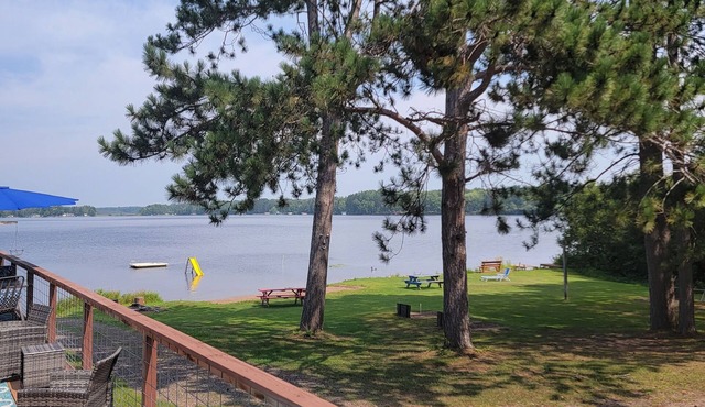 Rustic cabin getaway on the shore of Soo Lake in Phillips, WI