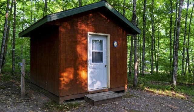 Rustic Cabin Nestled in the Trees for a Unique Outdoor Experience in White Lake, Wisconsin