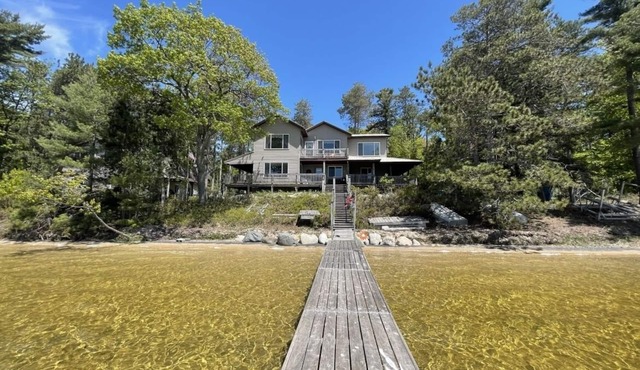 Spacious 5-Bedroom Beaver Island Lakehouse on Lake G-Wifi & Watercraft Included!