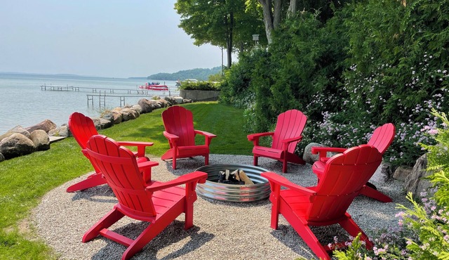 Stunning 150' ft footage on bay, 2 beachfront homes, 5 bedrooms & game room.