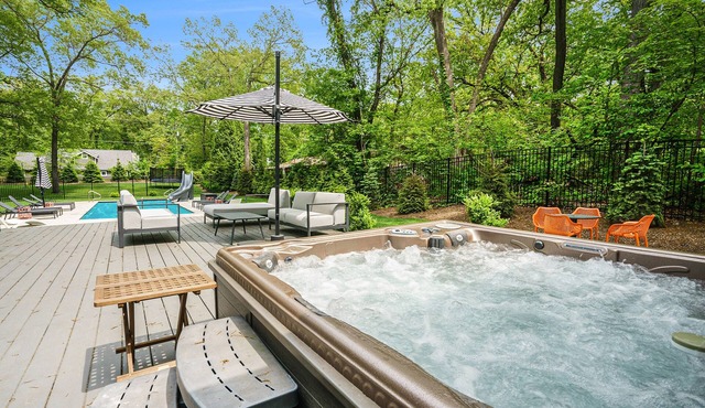 Stunning lake retreat with private pool, hot tub, games, firepit, & lovely patio