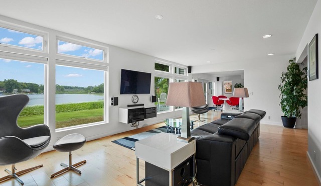 The views are amazing inside and out. Modern lake house with a double lot.