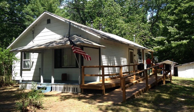 Three bedroom one bath home and 3 1/2 wooded acres