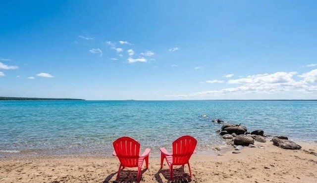 Tiny home with shared beach on Grand Traverse Bay