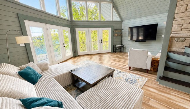 Welcome to our 5 bedroom UPSCALE vacation home next to beautiful Paw Paw Lake