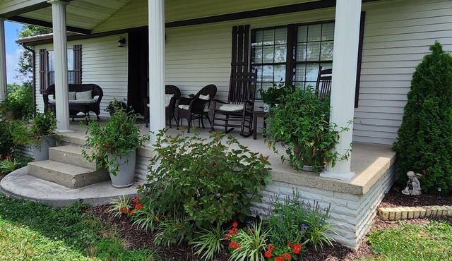 Welcome to our charming farmhouse retreat nestled in the Kentucky countryside.