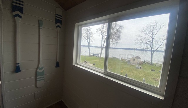 Wide open lake views and large flat front yard