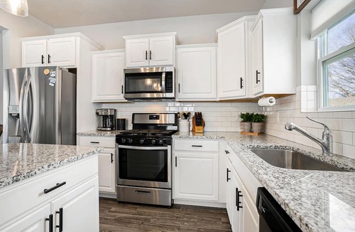 Douglas House | Charming home near Michigan's lakes with game room, chef's kitchen, & deck