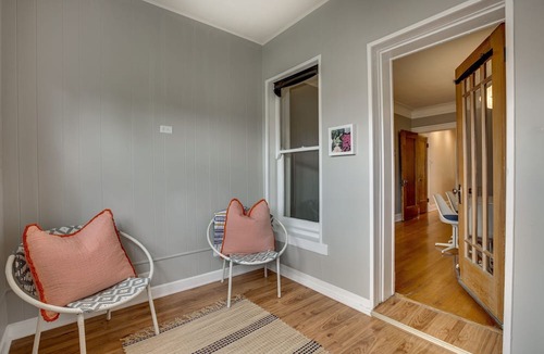 North Center Apartment | Light Filled with Tasteful Pops of Color - You Will Love This Mid-Century Modern Gem by AllSet Turnover