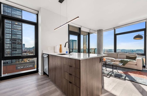 West Loop Apartment | West Loop Scenic Views + Private Balcony Retreat