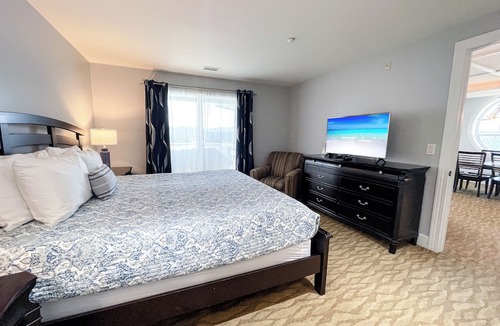 Traverse City Apartment | TC Retreat | Beachfront, Heated Outdoor Pool, Stunning Views