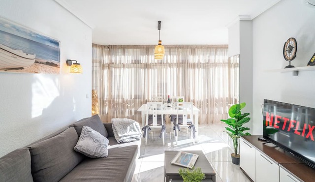 Beachfront Apartment in Lubina del Sol | Pool, Padel, Parking & Beach Access