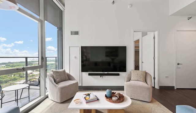 Elevated 2BR Retreat + Balcony with Bean Views